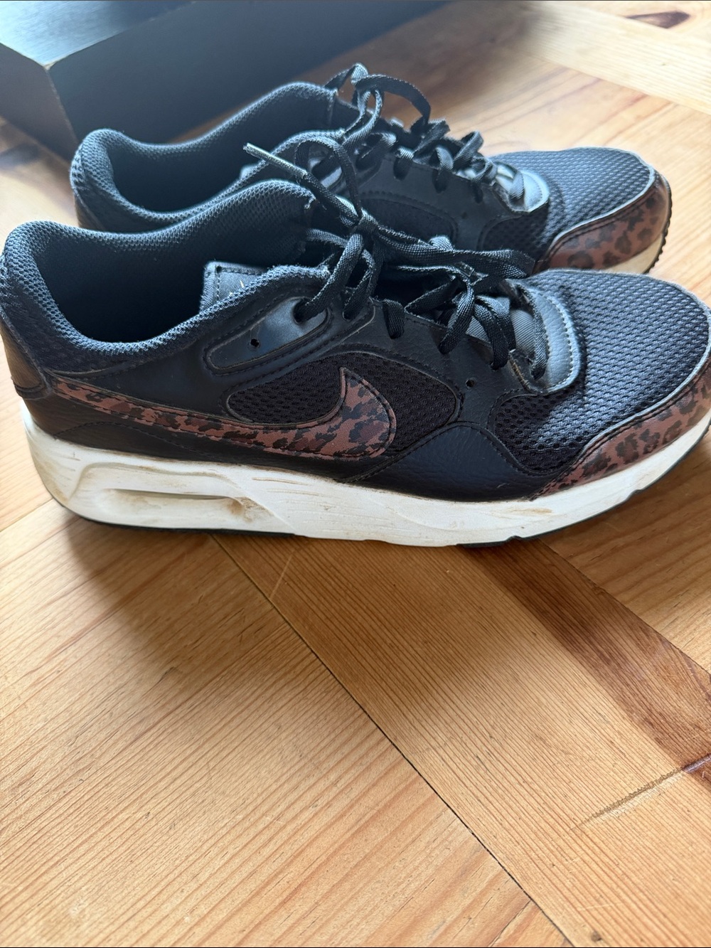 Nike Women's Black Sneakers with Leopard-Print Swoosh